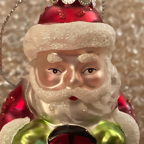 Santa riding a bumper car glass Christmas Ornament - Picture 5 of 8